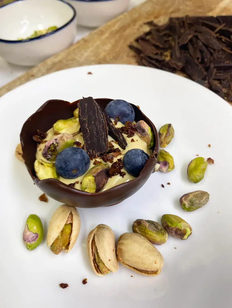 chocolate bowls with rich pistachio mousse and white cream 2